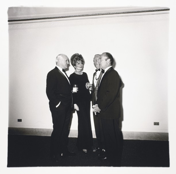 Four people at a gallery opening, N.Y.C.