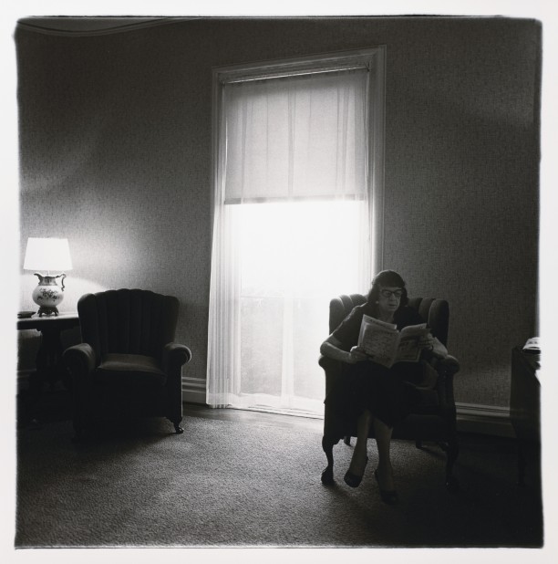 Lady in rooming house parlor, Albion, N.Y.