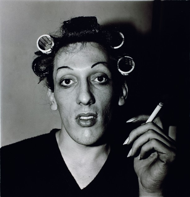 A young man in curlers at home on West 20th Street, N.Y.C.