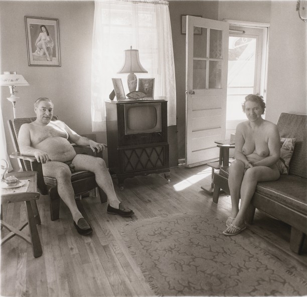 Reitred man and his wife at home in nudist camp one morning, N.J.