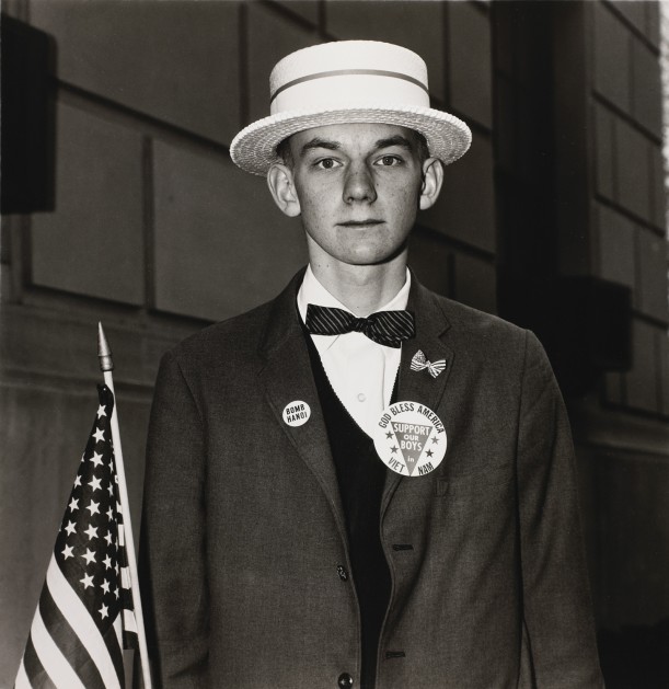 Boy with a straw hat waiting to march in a pro-war parade, N.Y.C.