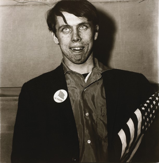 Patriotic young man with a flag, N.Y.C.