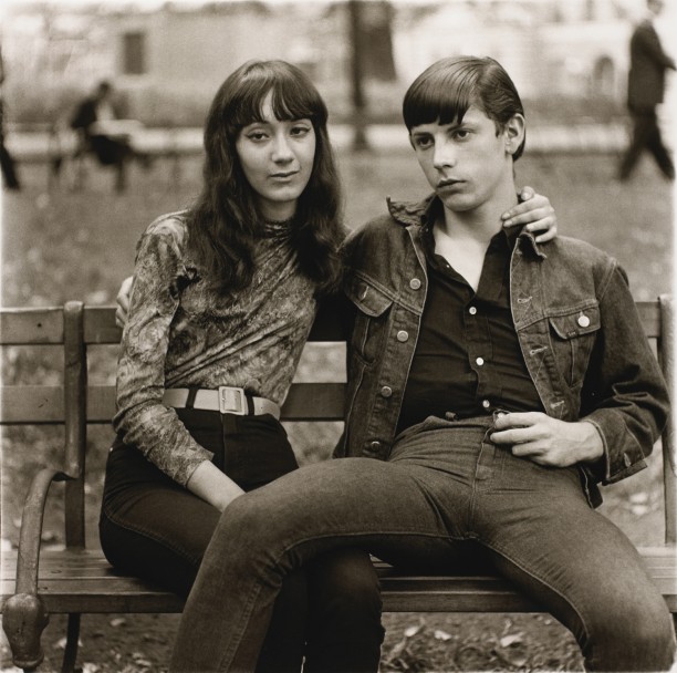 A young couple on a bench in Washington Square Park, N.Y.C.