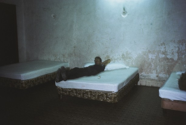 Brian in hotel room with three beds, Merida, Mexico