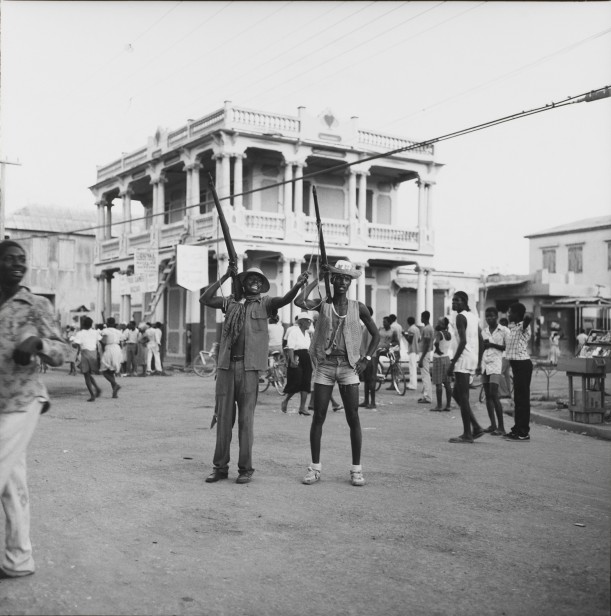 Two youths imitate the Tontons Macoute during Mardi Gras, Gonaïves