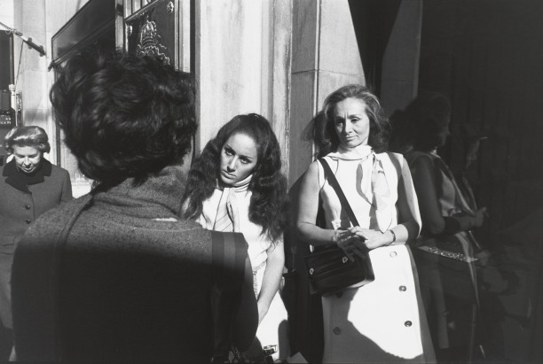 Untitled (Two women in sleeveless dresses and one with back to camera)