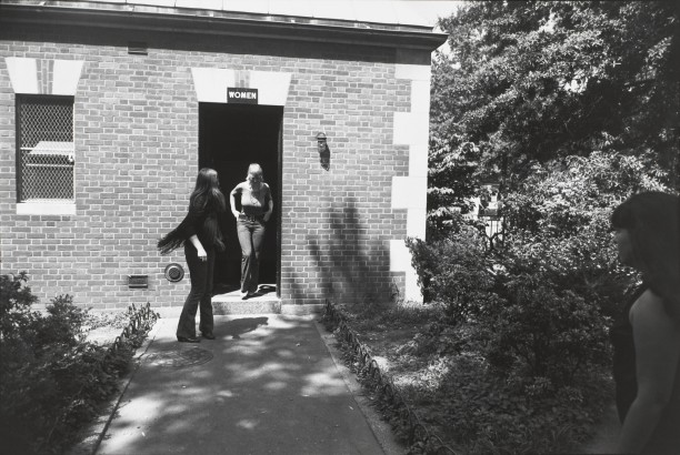 Untitled (Two women coming out of a public restroom)