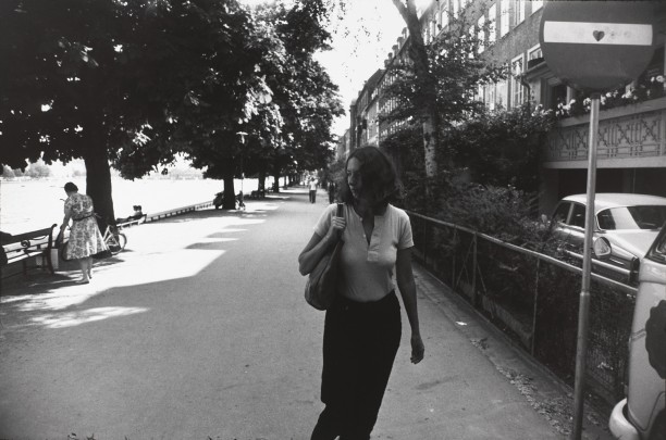 Untitled (Woman walking along side a river)