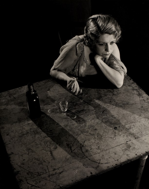 Sad Woman at Table